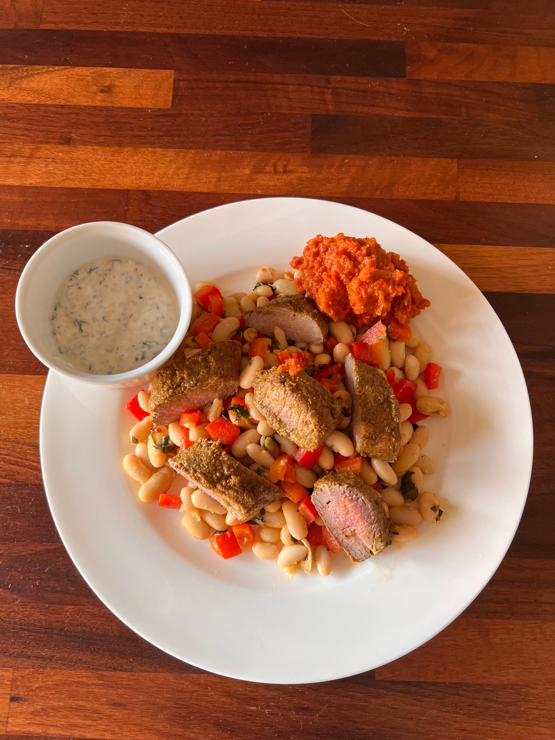 Spiced Fillet of Lamb with Cannellini Beans