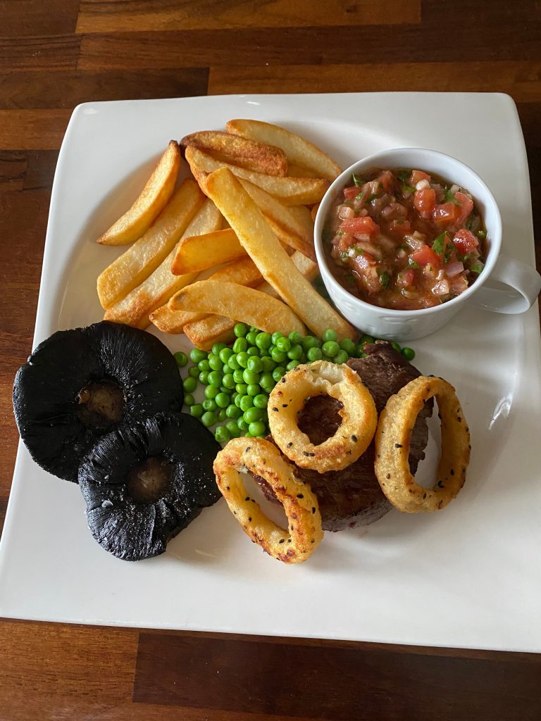 Steak with Tarragon Tomato Dressing and Oven Chips